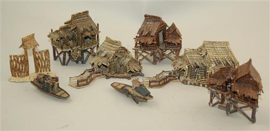 Ten Japanese stoneware models of houses, boats and bridges, early 20th century, tallest 9cm